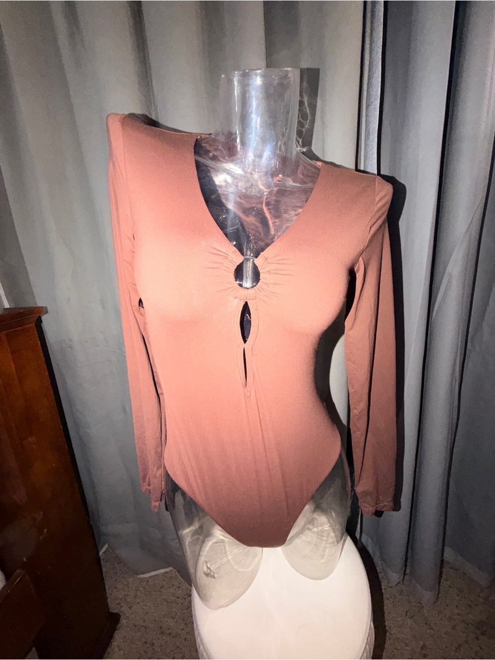 Long-Sleeve brown Ring-Front Bodysuit with snap closure